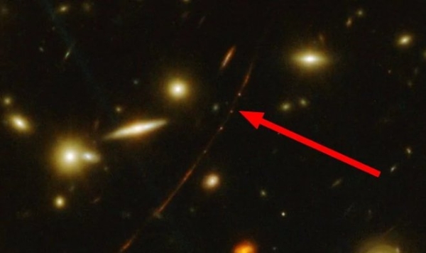 Телескоп «Джеймс Уэбб» прислал снимок самой далекой известной звезды во вселенной